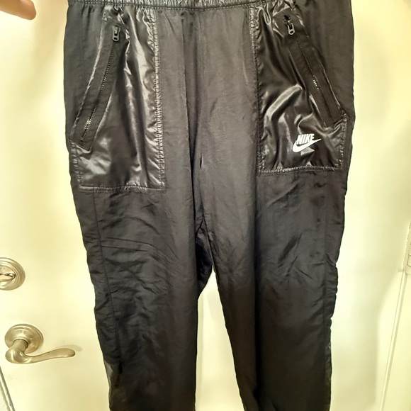 Nike Unisex Black Joggers with Zipper Pockets - Picture 1 of 3